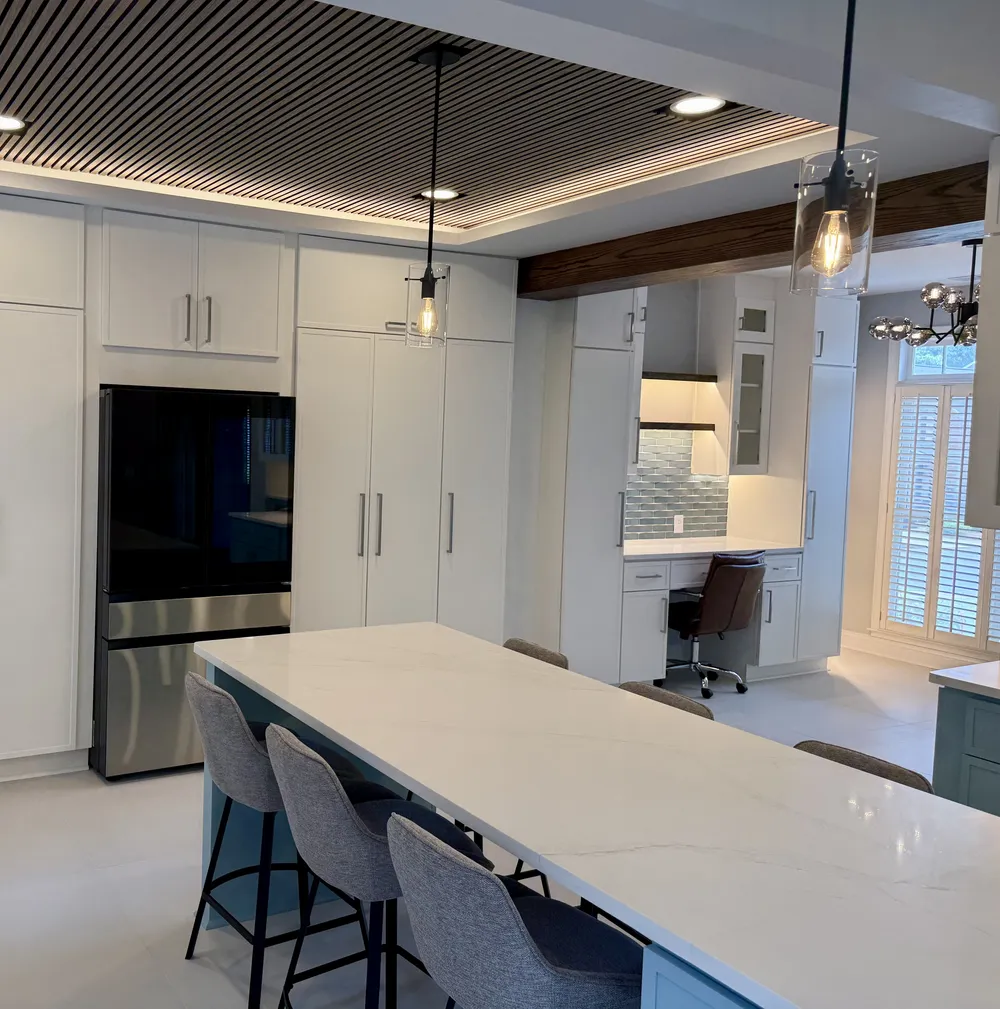 Countertop and cabinetry detail in a recently finished light blue kitchen.
